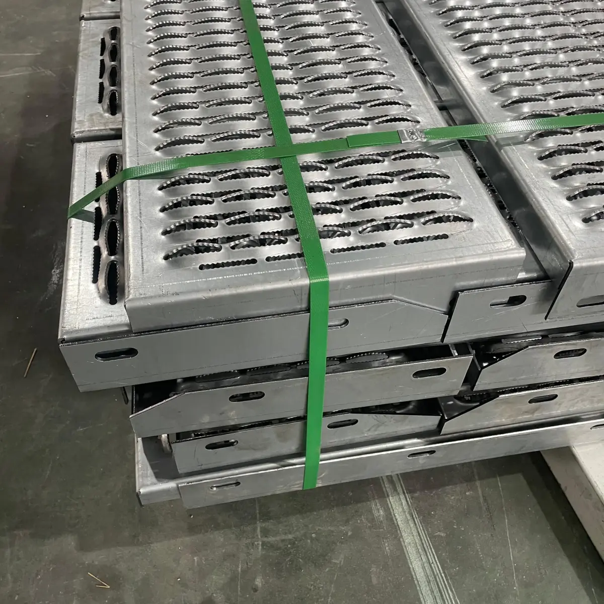 Safety grating punching and forming production